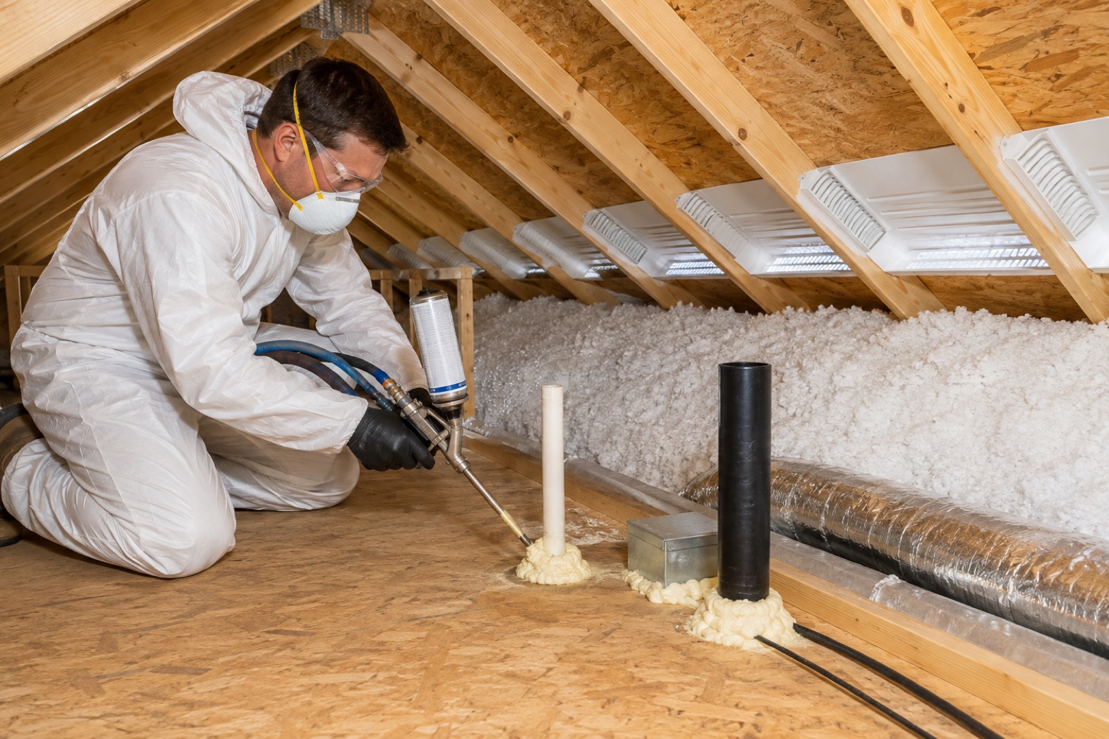 Attic air sealing detail as part of an attic performance upgrade