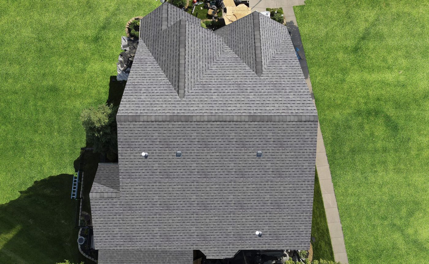 Aerial view of a completed roof replacement in San Antonio