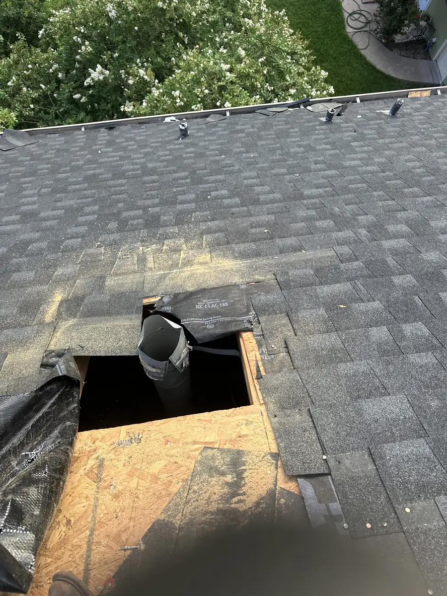 Roof vent pipe boot exposed during a repair inspection