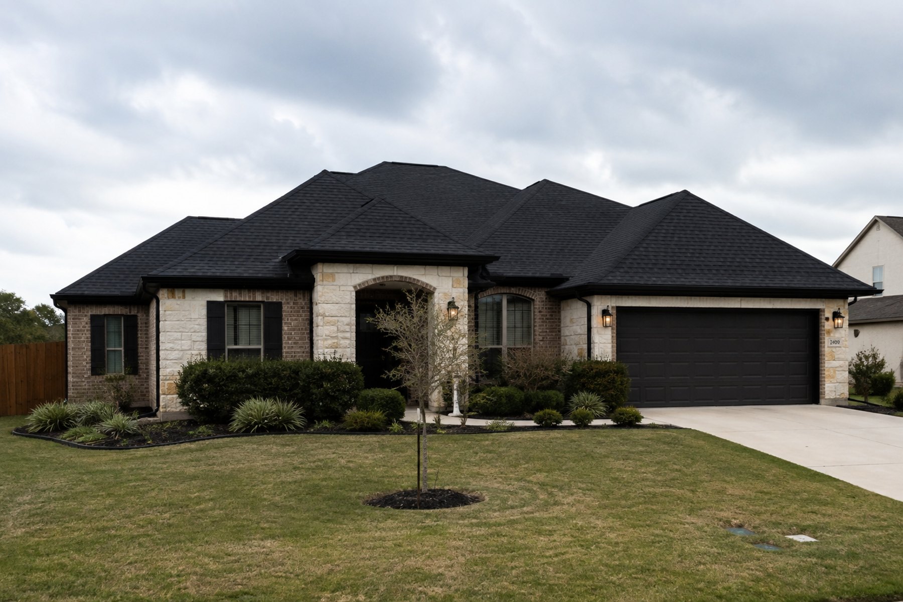 Finished Texas home with a new dark shingle roof