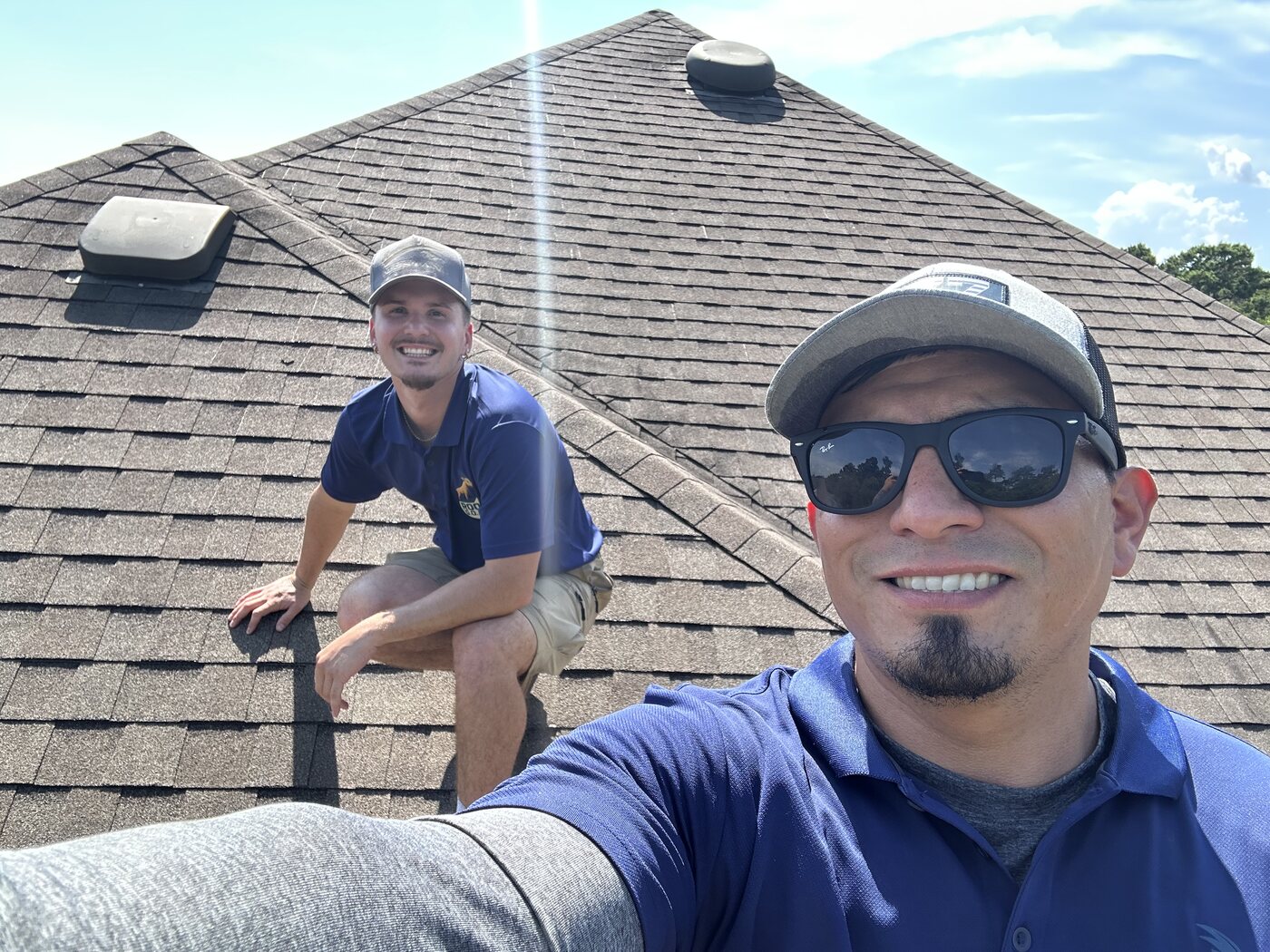 Charlie and the crew on a finished roof